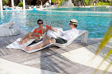 Image showing happy young couple relax and take fresh drink