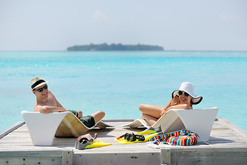 Image showing happy young couple have fun on beach