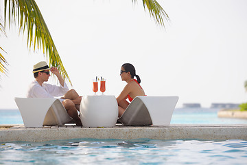 Image showing happy young couple relax and take fresh drink