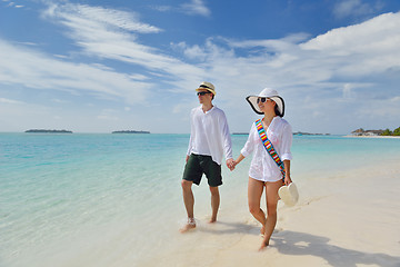 Image showing happy young couple have fun on beach
