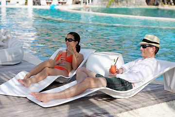 Image showing happy young couple relax and take fresh drink