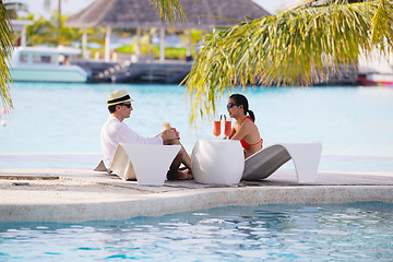 Image showing happy young couple relax and take fresh drink