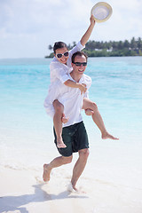 Image showing happy young couple have fun on beach