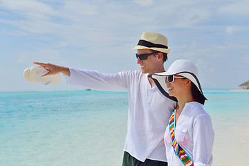 Image showing happy young couple have fun on beach