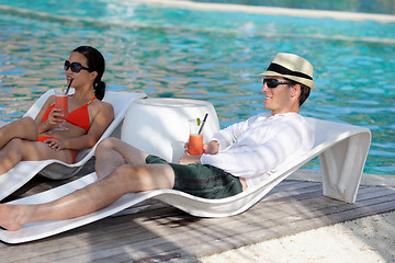 Image showing happy young couple relax and take fresh drink