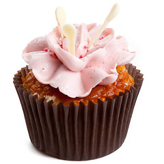 Image showing sweet tasty homemade cupcake with strawberry cream isolated