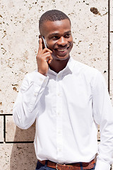 Image showing young successfil african businessman with mobilephone 