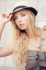 Image showing happy young blonde woman with hat outdoor summertime