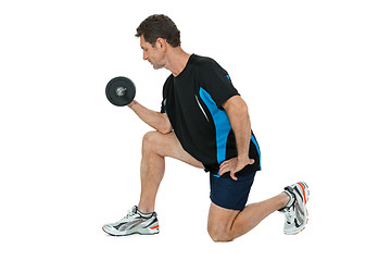 Image showing adult attractive man with iron dumbbell isolated