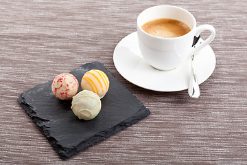 Image showing sweet delicious truffle pralines chocolate and hot espresso coffee