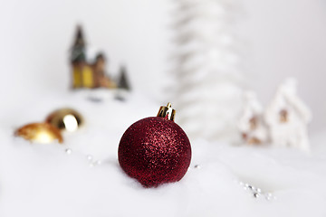 Image showing Christmas balls in the snow