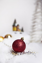 Image showing Christmas balls in the snow