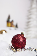 Image showing Christmas balls in the snow