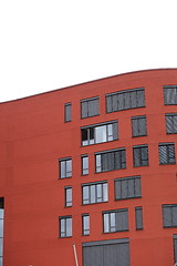 Image showing Exterior of a red building with windows