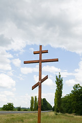 Image showing orthodox cross on near road