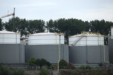 Image showing Three industrial storage tanks