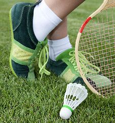 Image showing foot of sportswoman on grass