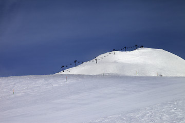 Image showing Ski slope and ropeway against blue sky