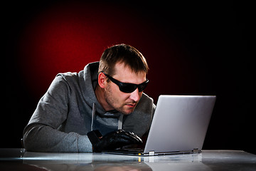 Image showing Hacker with laptop