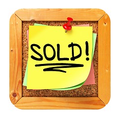 Image showing Sold!. Yellow Sticker on Bulletin.