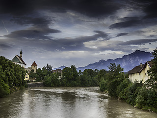 Image showing River Lech in Fussen with historic church and alps