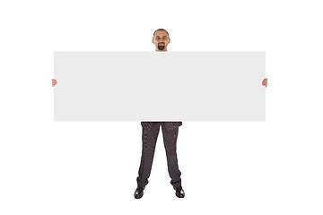 Image showing Smiling businessman holding a really big blank card