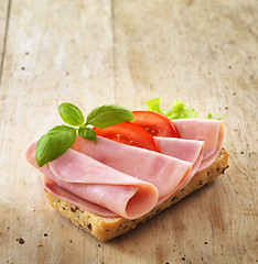 Image showing bread with sliced pork ham