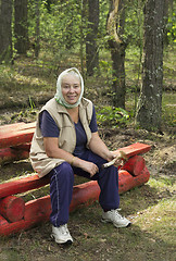 Image showing Elderly woman found a mushroom