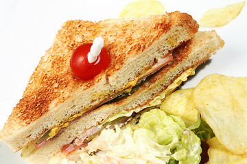 Image showing Club sandwich with salad