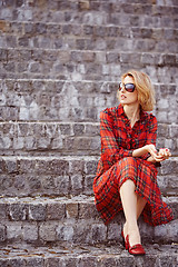 Image showing Beautiful girl in a red dress