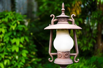 Image showing Street lamp in the green garden