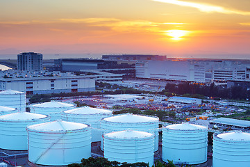 Image showing Oil tanks for cargo service during sunset