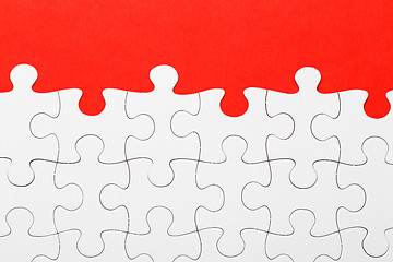 Image showing Incomplete puzzle in red color