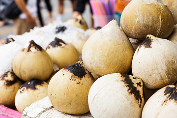 Image showing Young coconut drinks on street