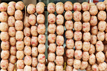 Image showing Thai style fresh sausage on street market in thailand