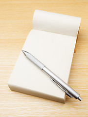 Image showing Memo pad and pen