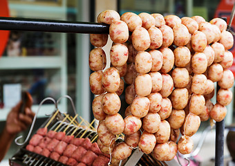 Image showing Thai style grilled sausage on street market in thailand