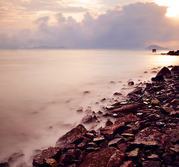 Image showing Sunset sea coast and stone
