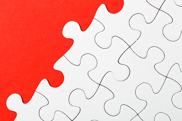 Image showing Incomplete puzzle in red color