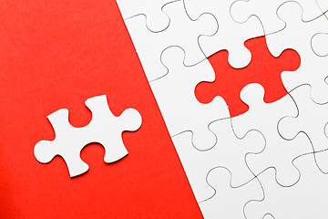 Image showing Incomplete puzzle with missing piece