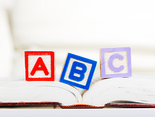 Image showing Alphabet block with ABC on book