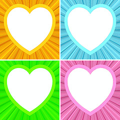 Image showing Set of blank heart shaped frames on colorful background