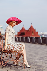 Image showing Girl with red elements of clothing