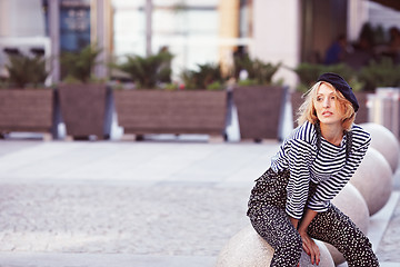 Image showing Beautiful girl in the striped vest