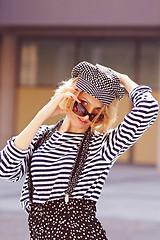 Image showing Beautiful girl in the striped vest