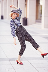 Image showing Beautiful girl in the striped vest