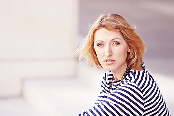 Image showing Beautiful girl in the striped vest