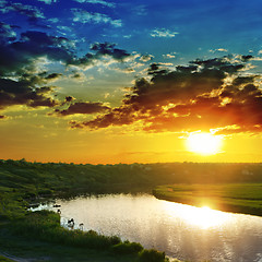 Image showing dramatic sunset over river