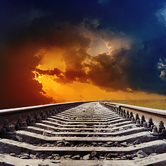 Image showing railroad goes to dramatic sunset