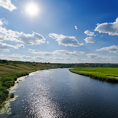 Image showing sun over river with light waves
